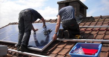 blue-collar workers inflation reduction act solar power panels